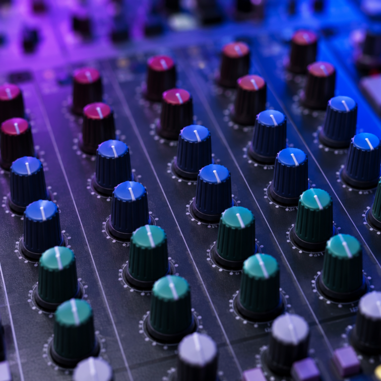 EQ knobs on an analog mixing console